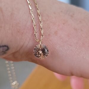 Elegant Gold Necklace with Peach Crystal Pendant